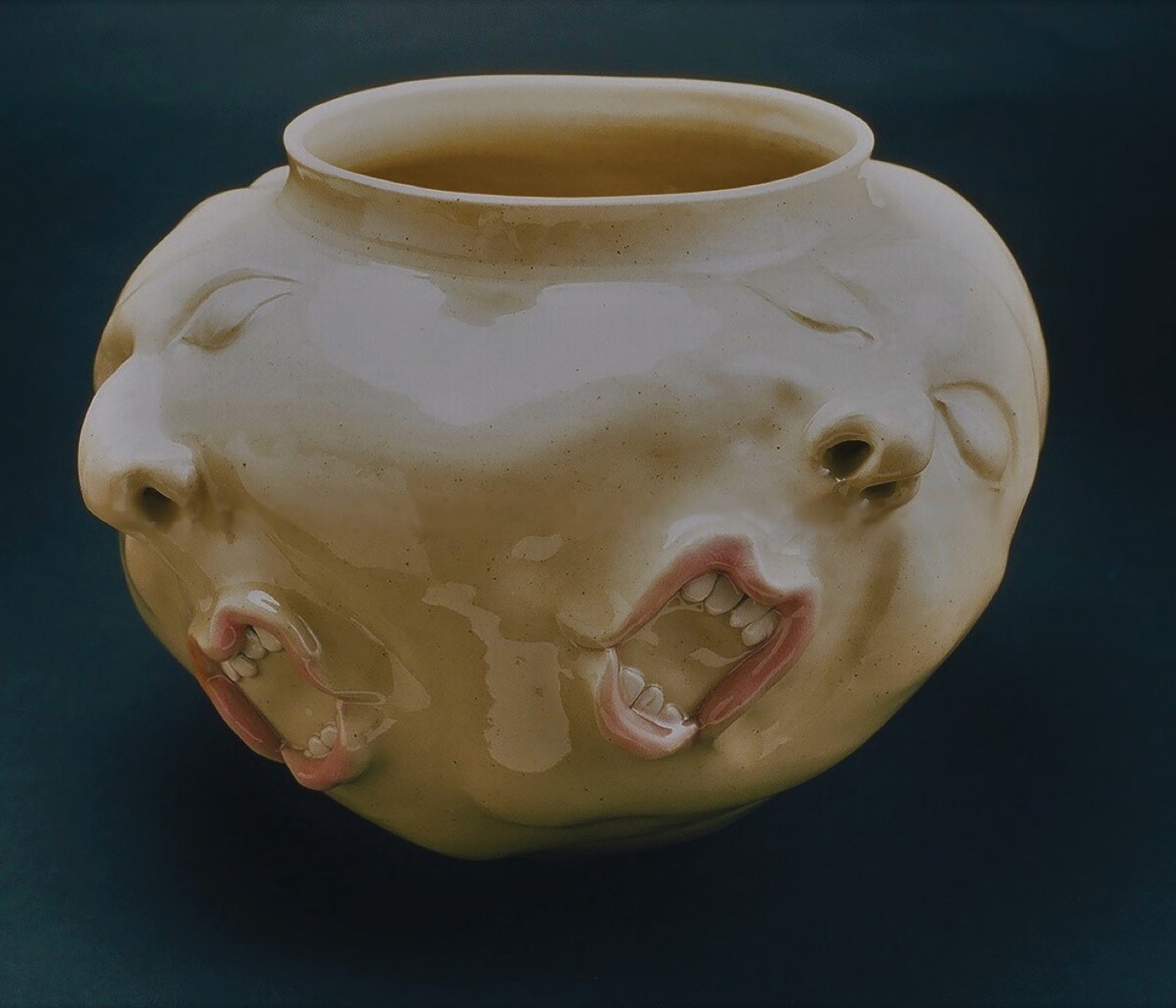 Sculptural ceramic vase shaped like a face