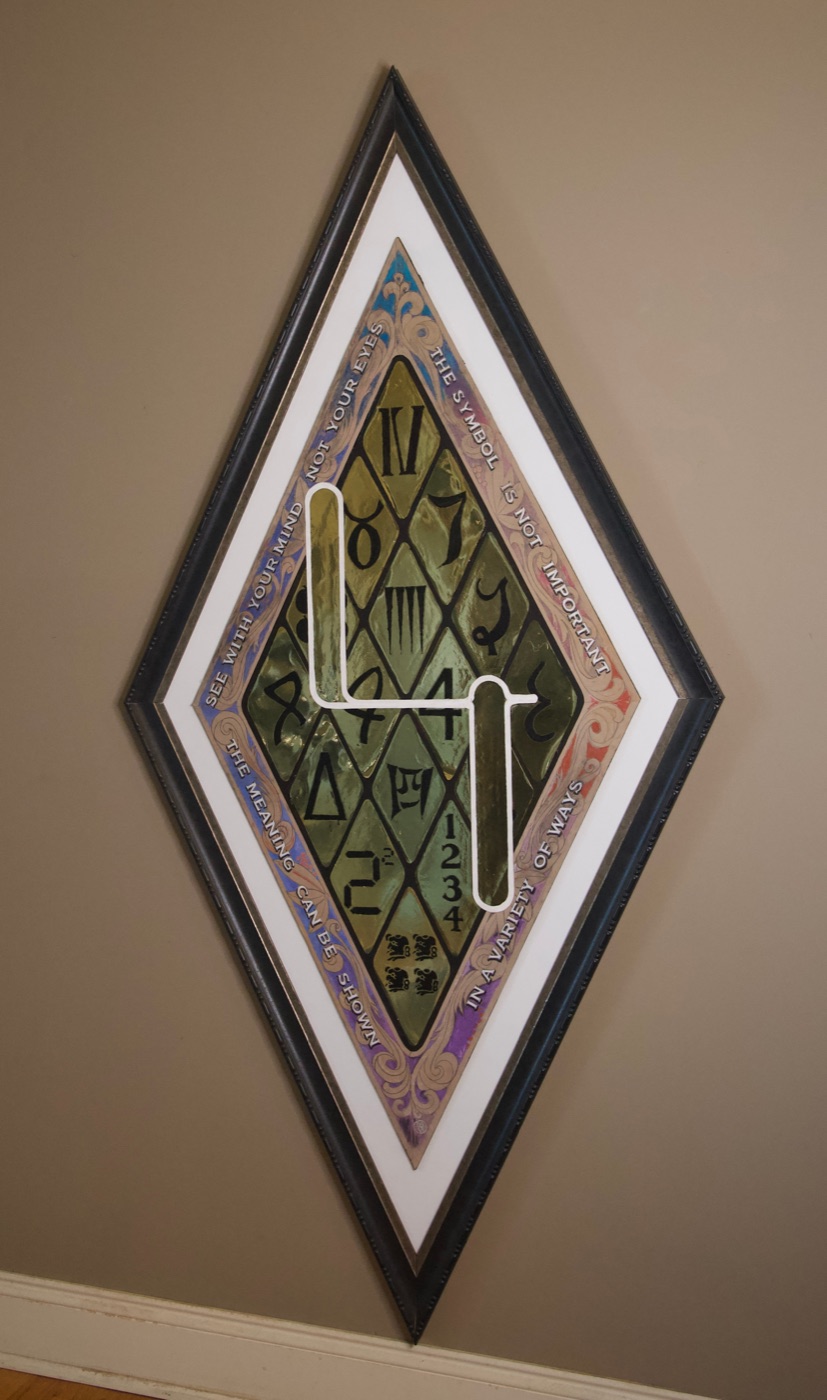 Diamond-shaped conceptual wall sculpture with clock symbols