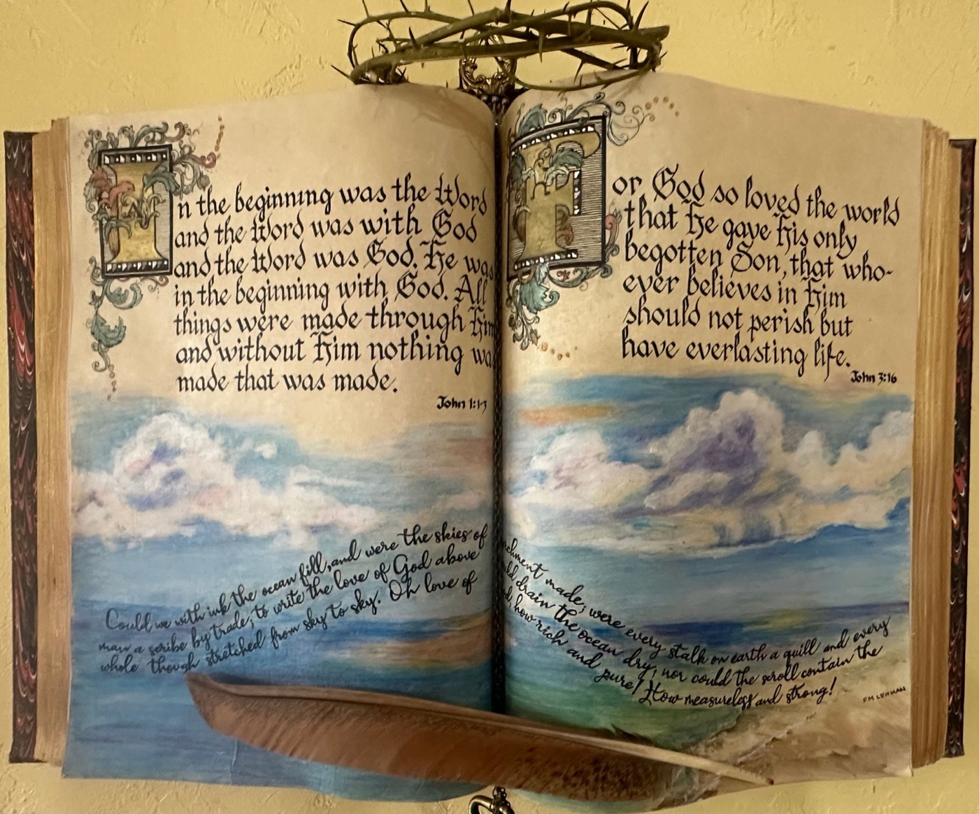 Mixed-media assemblage artwork of an illuminated scripture book
